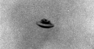 Airline Passenger Shot Video Of Metallic-Looking UFO Flying By