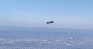 Terrified mum describes moment she spotted ‘UFO hovering over New York City’ out of plane window