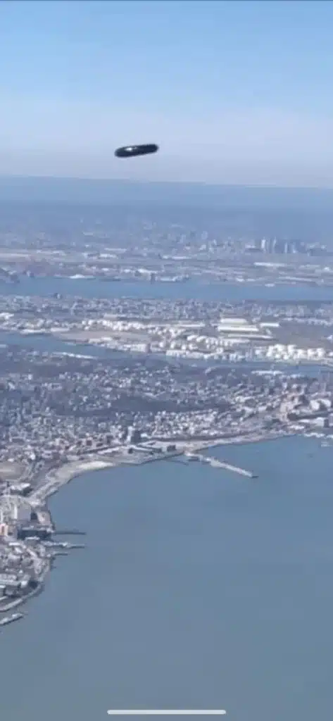 Airline passenger captures video evidence of UFO-like object over New York City
