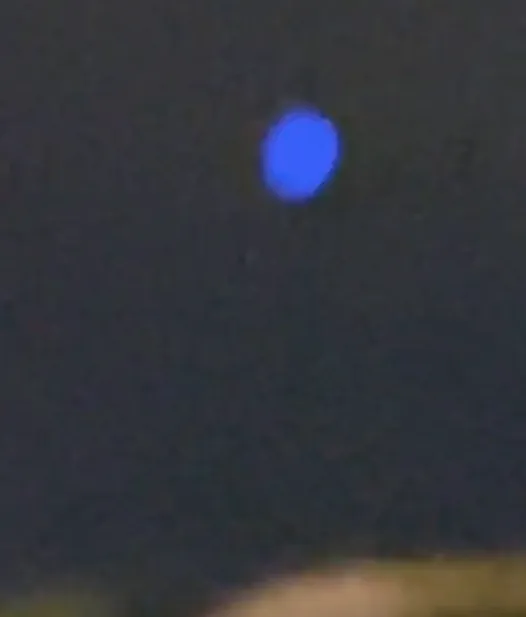 Pulsating Blue-Cigar Shaped UFO Captured In Video Over Phoenix