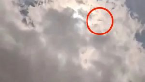 Watch moment UFO appears during solar eclipse in front of stunned crowds as they scream ‘what the f*** was that?’