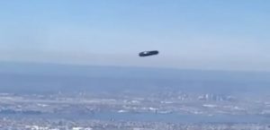 Passenger spots ‘flying cylinder UFO’ from plane window