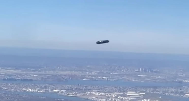 Video Of Flying Cylinder UFO Shot By Plane Passenger