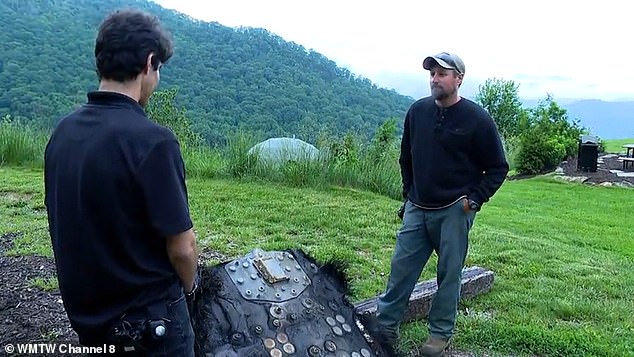 Clontz had to improvise to tow this apparent hull panel from the SpaceX Dragon's trunk out of off the trail because it was so massive: 'I just tied a rope to it and drug it out with a lawn mower'