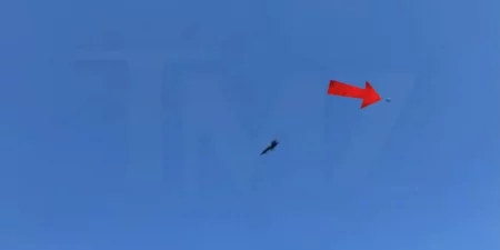 UFO spotted zipping past Blue Angels F/A-18 Super Hornet during airs how over New York beach