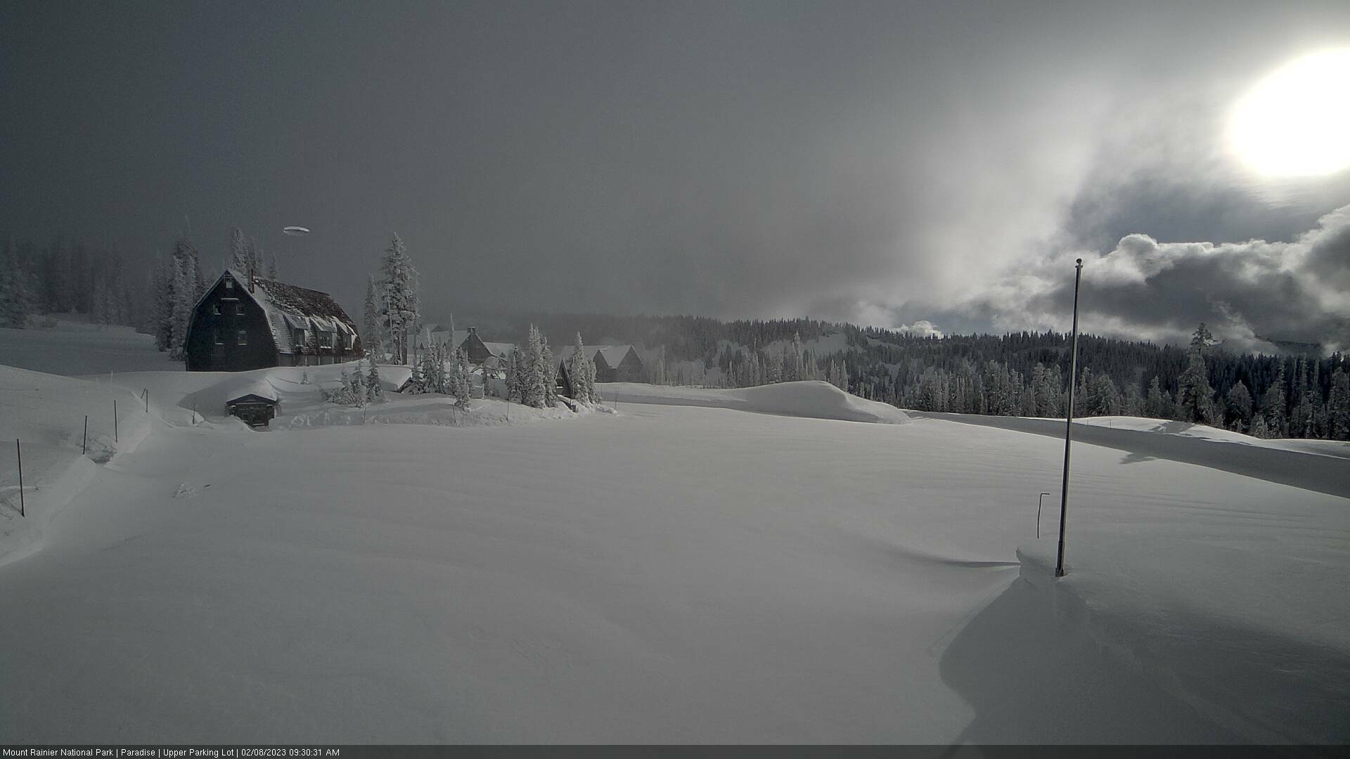 Image courtesy The National UFO Reporting Center (NUFORC)
An alleged UFO was spotted at Mt. Rainier on Feb. 3, 2024, via a Paradise parking lot webcam. You can see the shape above the building; according to the reporter, the shape was gone when the photo was refreshed a minute later.