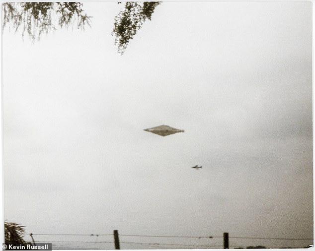 Two British friends took this UFO picture then vanished after a visit from sinister men in dark suits. Breaking his silence after 34 years, their old colleague now reveals what happened and says: ‘They were not meant to see it’