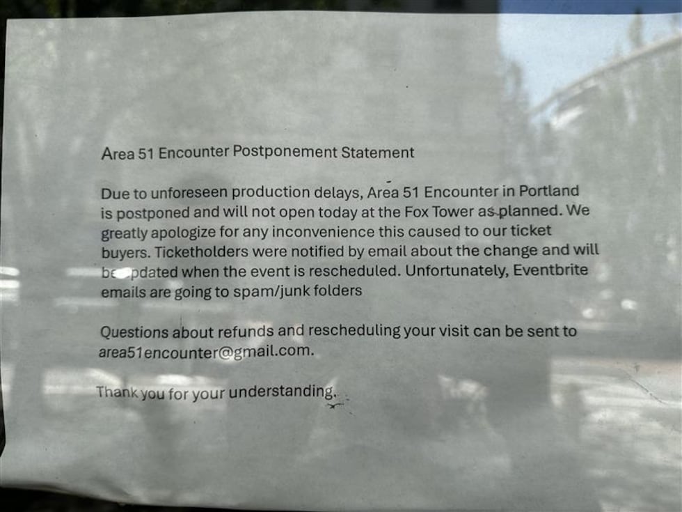 A sign taped to the inside of a window at Fox Tower in downtown Portland announces that the...