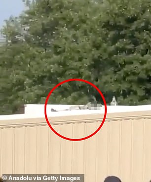 Authorities believe the shooter (pictured after the shooting) acted alone. Currently, there is no evidence he had any accomplices