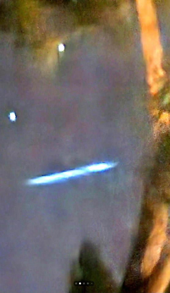The man's wife initially believed the UFO, pictured here in an over-exposed, zoomed-in photo, was a shooting star or meteor shower