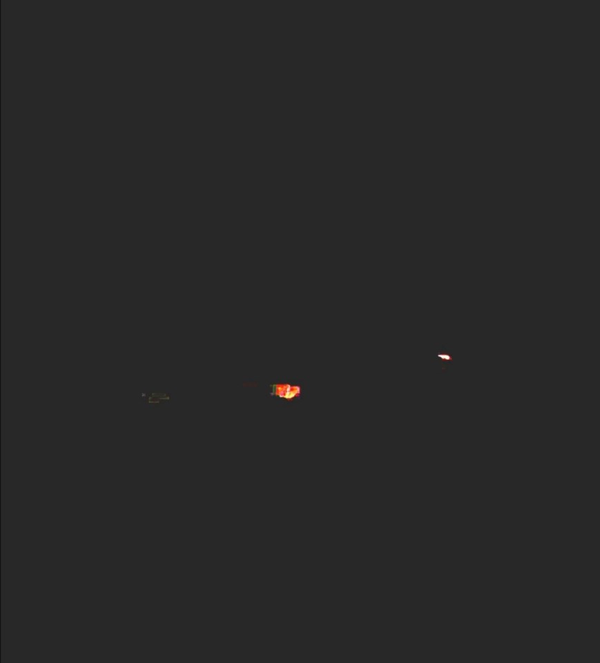 The man was able to snap a photo of the UFO, which had orange and red rotating lights, silently soaring above his home