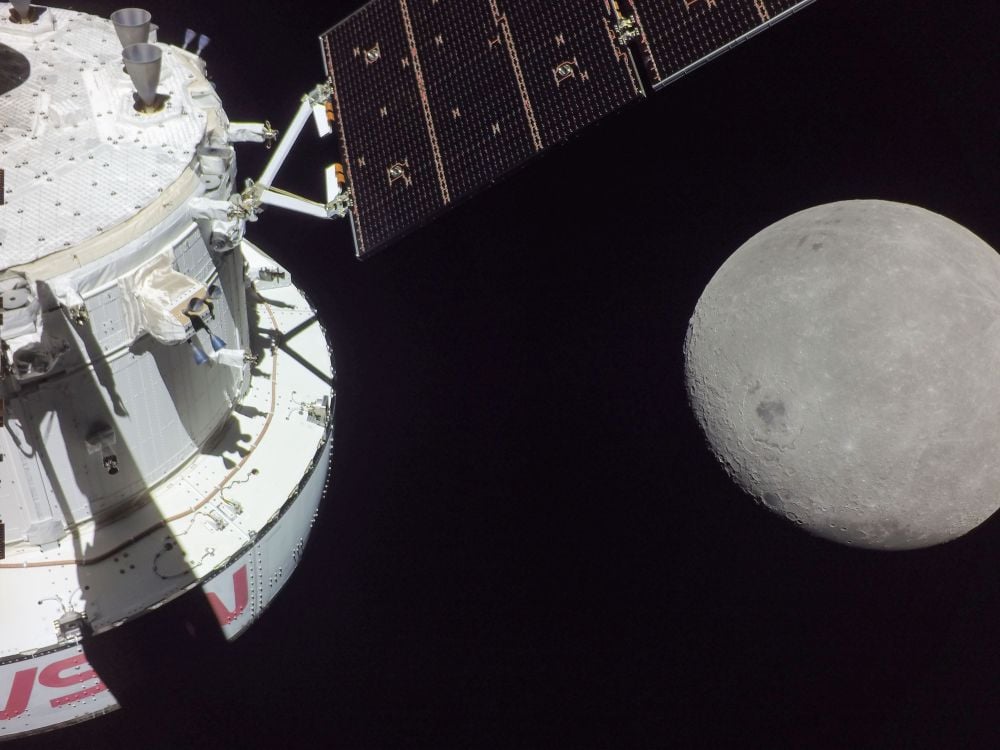 This image shows the Orion Capsule and European Service Module doing a flyby of the Moon during the Artemis 1 uncrewed mission in 2022. Image Credit: NASA. Public Domain