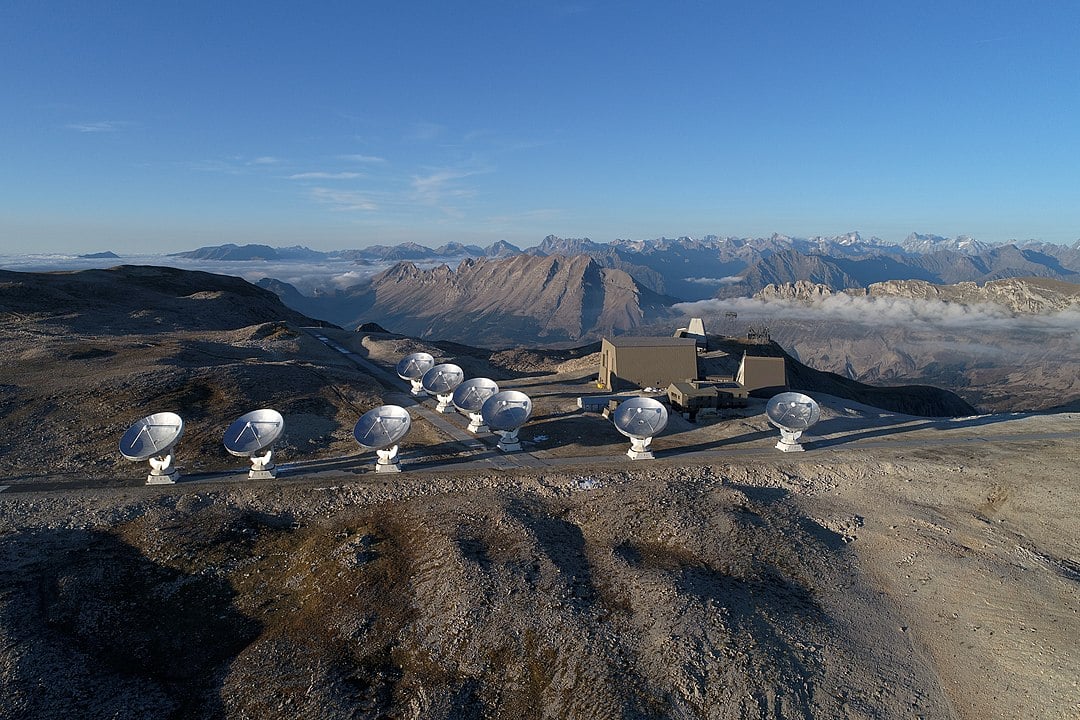 Aerial photo from Plateau de Bure NOEMA observatory showing 9 of 12, 15 metre antennae. During observations, the antennas work as a single telescope, a technique called interferometry (Credit : IRAM-gre)