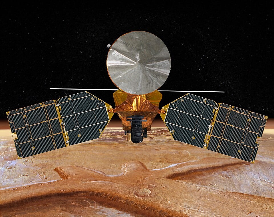 This artist's concept of NASA's Mars Reconnaissance Orbiter features the spacecraft's main bus facing down, toward the red planet (Credit : NASA/JPL/Corby Waste)