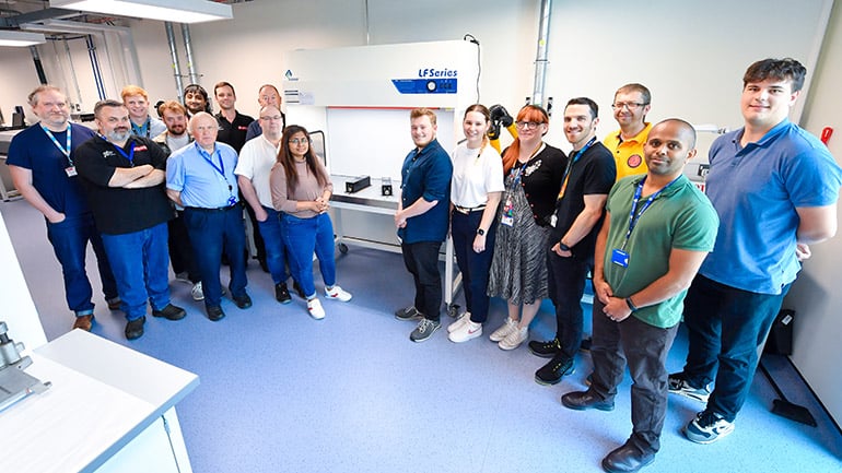 The University of Leicester and Exeter teams standing with the FDRSS unit. Credit: University of Leicester.